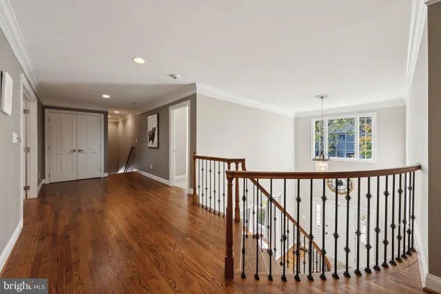 a bathroom with a sink a large mirror and a bathtub