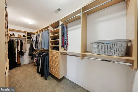 a bed room with a bed and a window