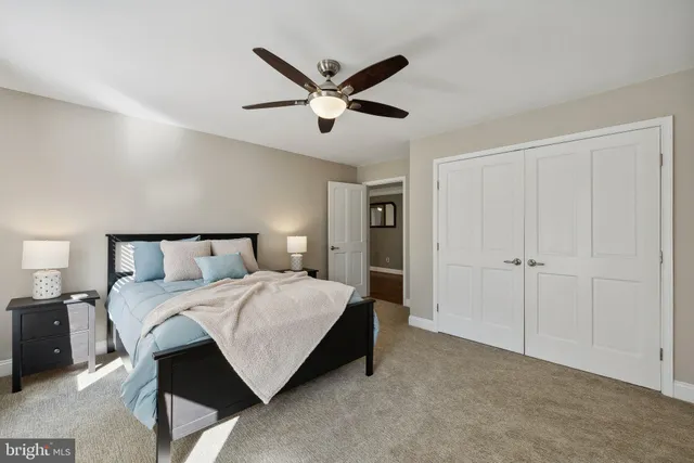 a room with wooden floor table tennis and stairs