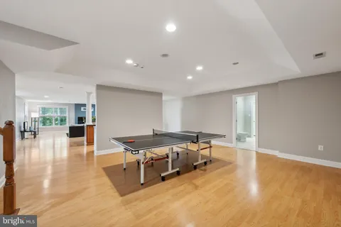 a spacious bedroom with a bed and a walk in closet