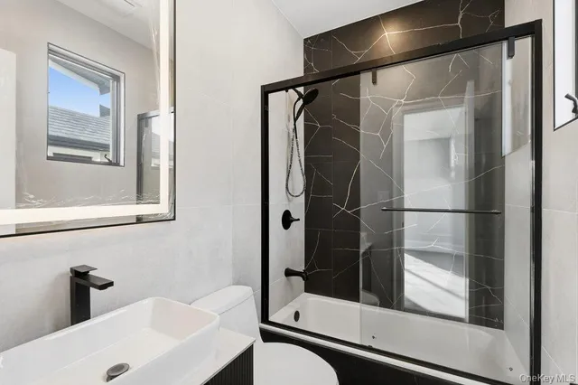 a front view of building with yard