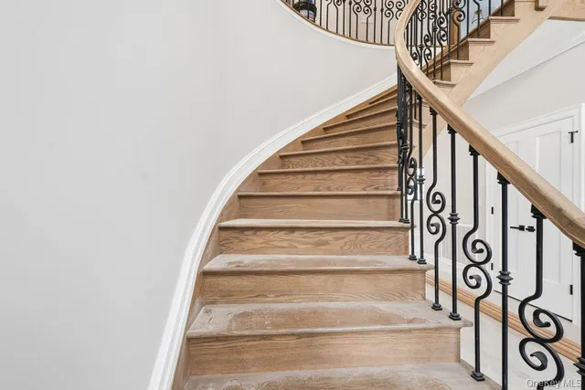 a view of an empty room and closet area