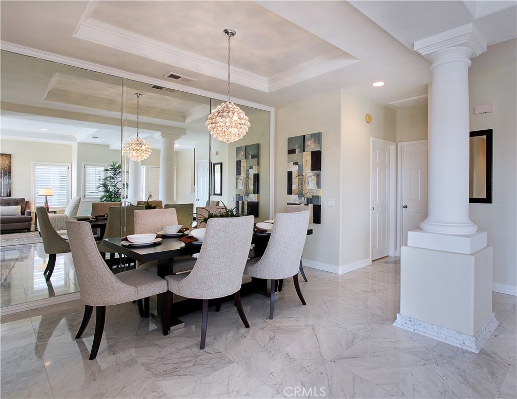 7 Centre Court Dana Point, CA 92629 - Photo 16 of 59 Beautiful light and bright condominium with mirrored walls in dining room and marble flooring. (PHOTO FROM PRIOR STAGING HOME HAS BEEN PAINTED WITH NEW BASEBOARDS)