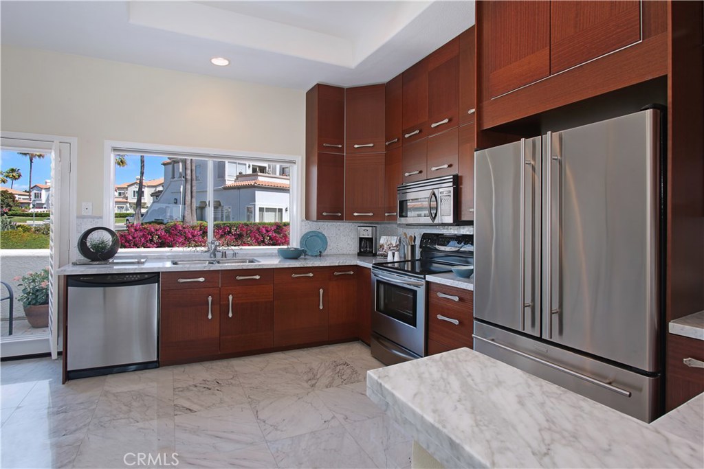 7 Centre Court Dana Point, CA 92629 - Photo 33 of 59 Another view of kitchen facing out towards east side of property.