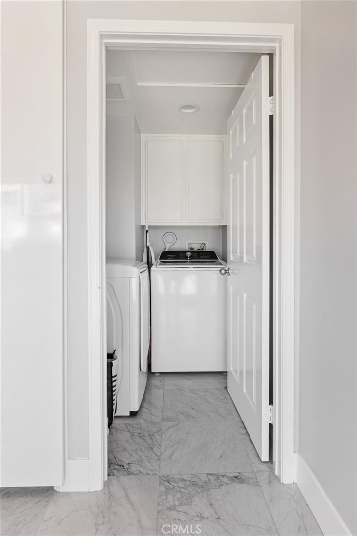 7 Centre Court Dana Point, CA 92629 - Photo 36 of 59 Interior Laundry room with washer and dryer.