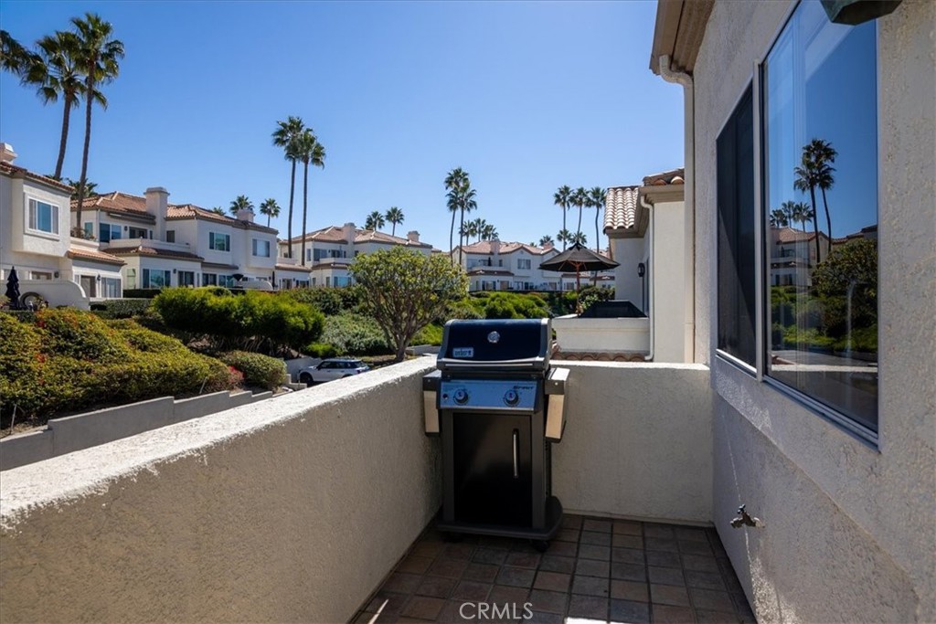 7 Centre Court Dana Point, CA 92629 - Photo 53 of 59 Back balcony off of kitchen.