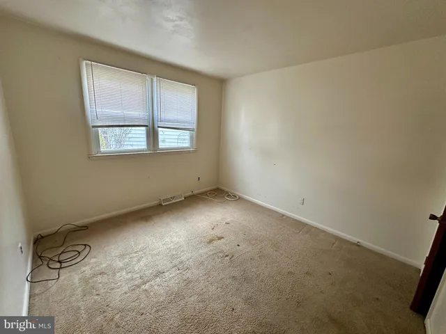 a view of a room with an empty space