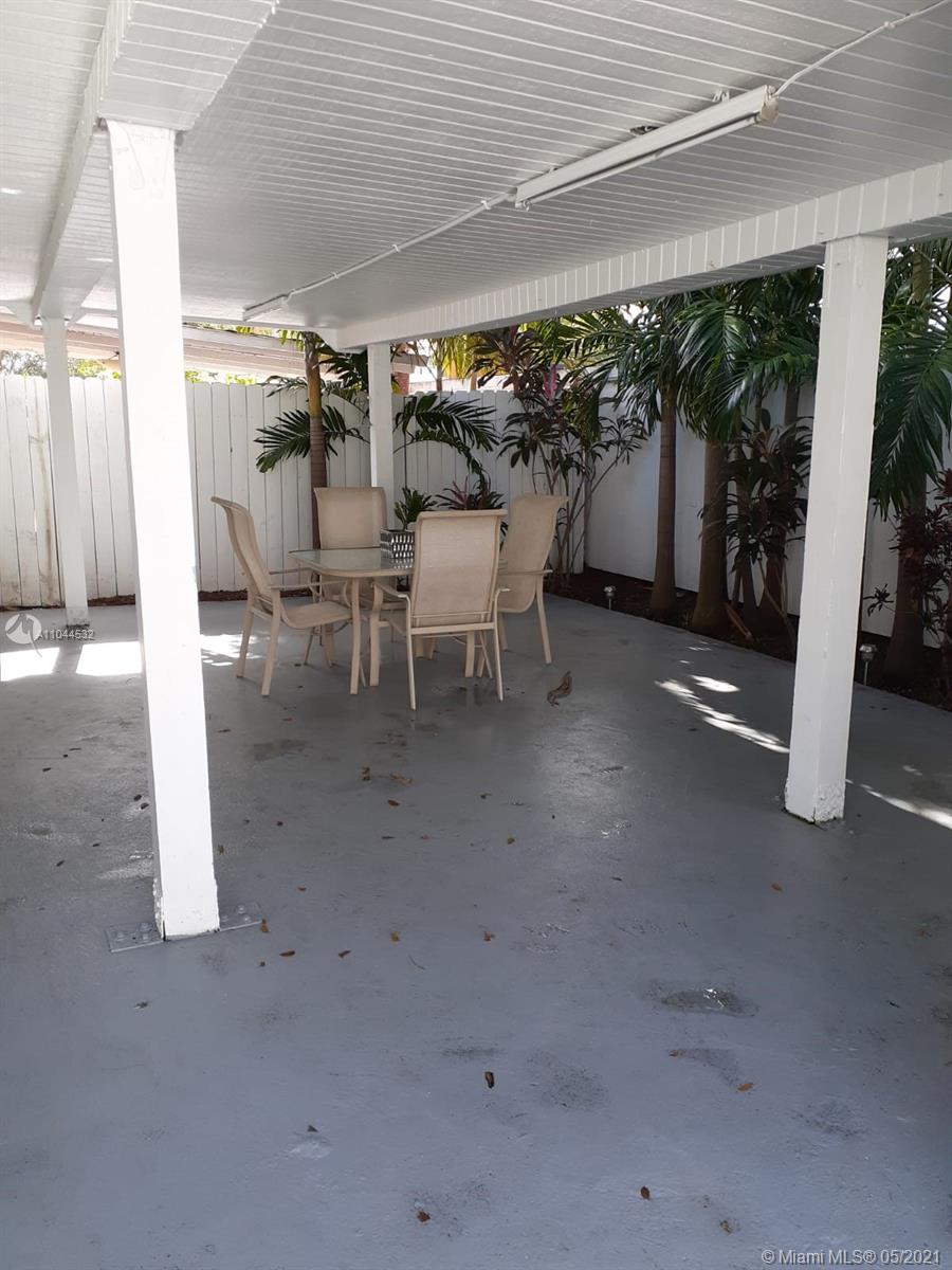 1404 Southwest 104th Court, Unit 89B Miami, FL 33174 - Photo 28 of 29 a view of a room with gym equipment