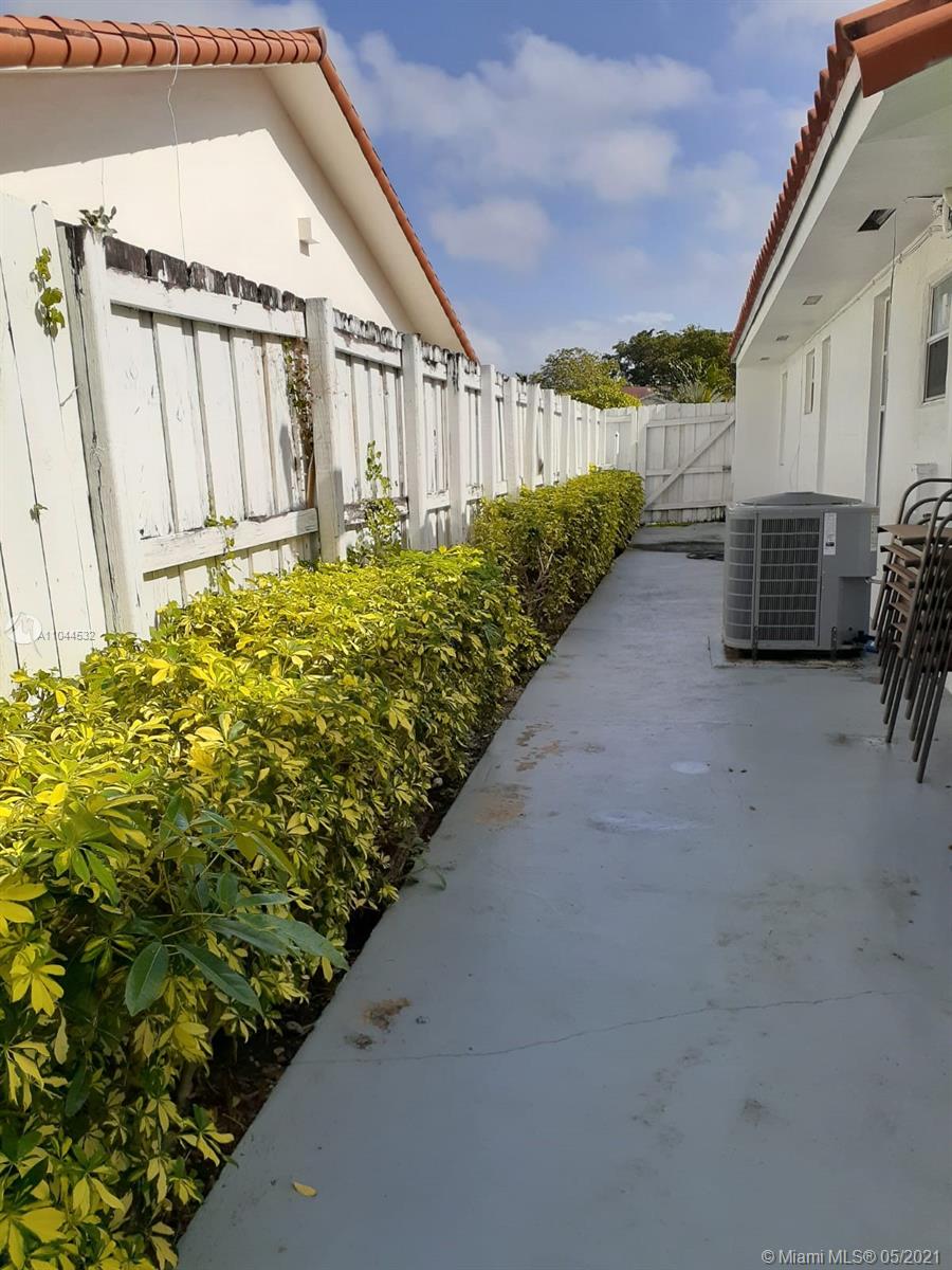 1404 Southwest 104th Court, Unit 89B Miami, FL 33174 - Photo 29 of 29 a view of a house with a balcony