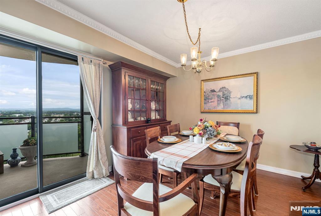 125 Prospect Avenue, Unit 16C Hackensack, NJ 07601 - Photo 18 of 35 a view of a dining room with furniture window and outside view