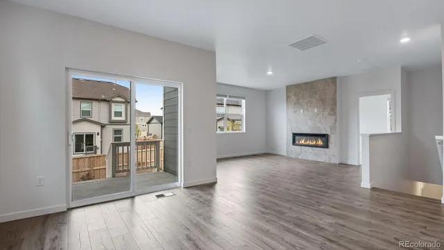 a view of livingroom with hardwood floor and hallway