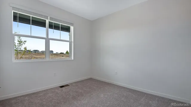 an empty room with a window