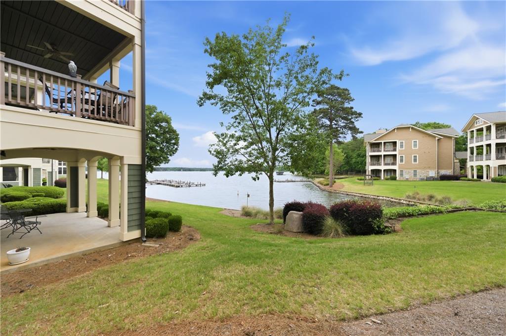 117 South Bay Road, Unit 402 Eatonton, GA 31024 - Photo 38 of 48 a front view of a house with garden