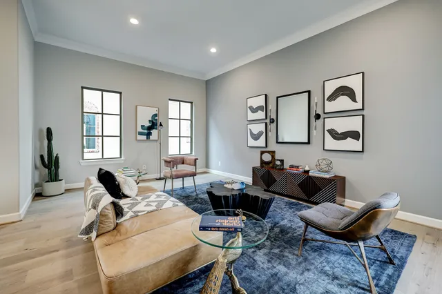 a living room with furniture or couch and a window