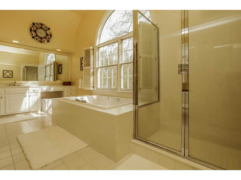 133 Stephen Mather Road Darien, CT 06820 - Photo 13 of 24 a large bathroom with a glass shower door