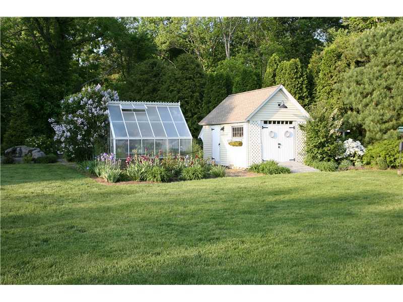 133 Stephen Mather Road Darien, CT 06820 - Photo 21 of 24 a view of a house with backyard and garden
