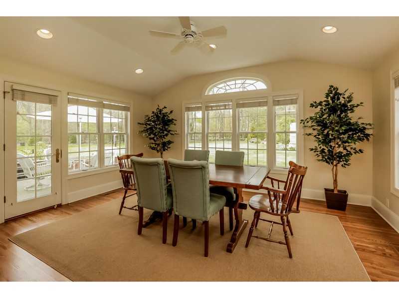 133 Stephen Mather Road Darien, CT 06820 - Photo 8 of 24 a view of a dining room with furniture window and outside view