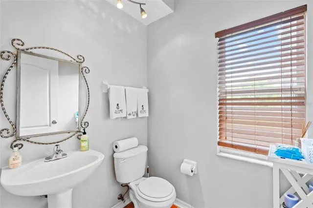 a bathroom with a sink double vanity granite tub and shower