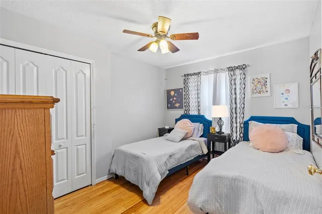a bathroom with a sink toilet double vanity and shower