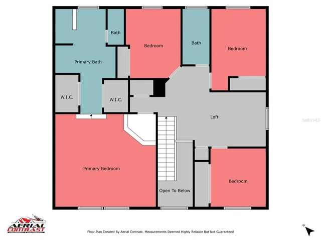 an aerial view of residential houses with outdoor space and swimming pool