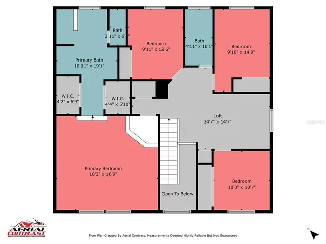 an aerial view of residential houses with outdoor space and swimming pool