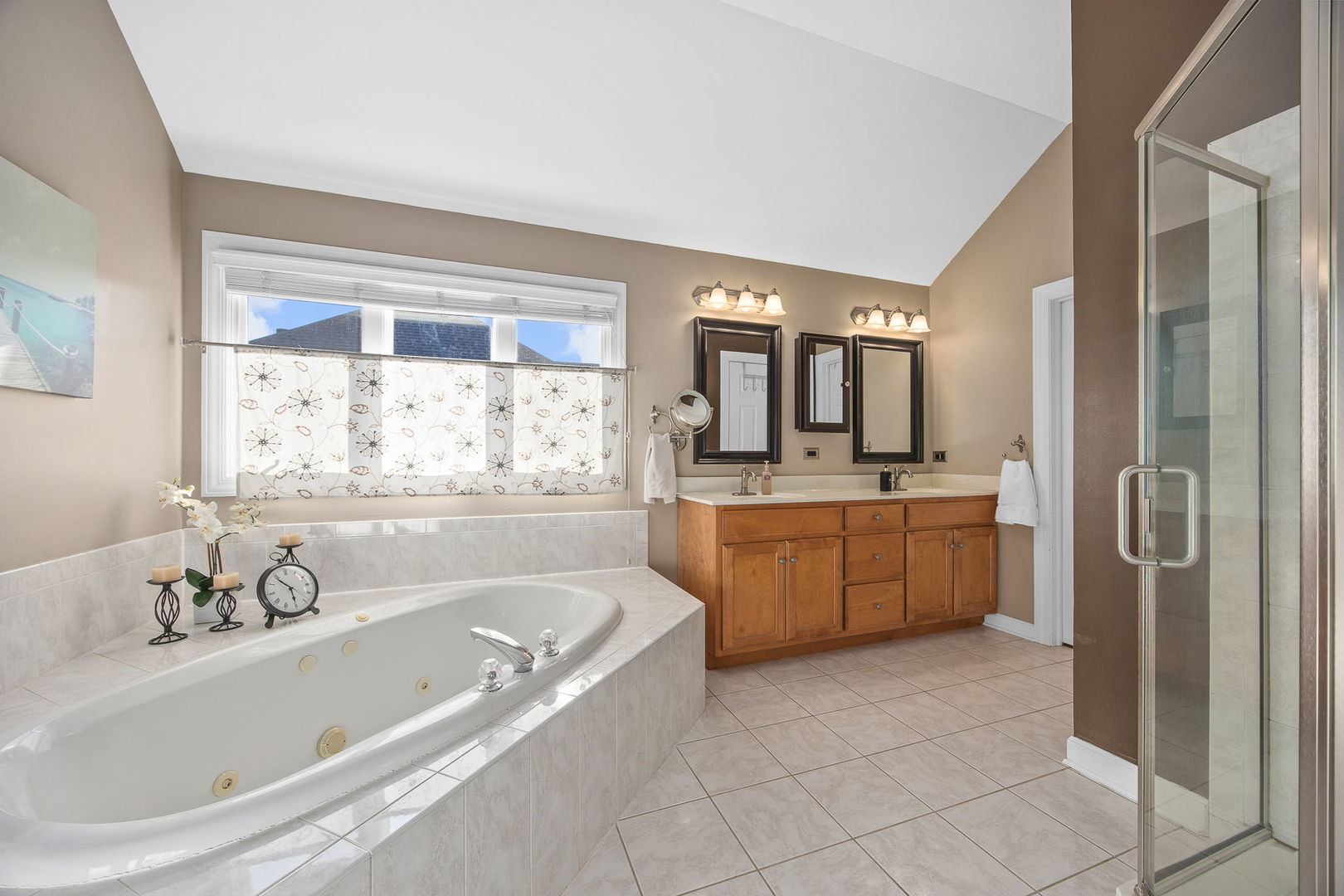 2816 Cordgrass Road Naperville, IL 60564 - Photo 24 of 49 a spacious bathroom with a tub sink and mirror