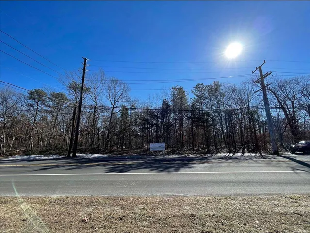 a view of a building with a yard