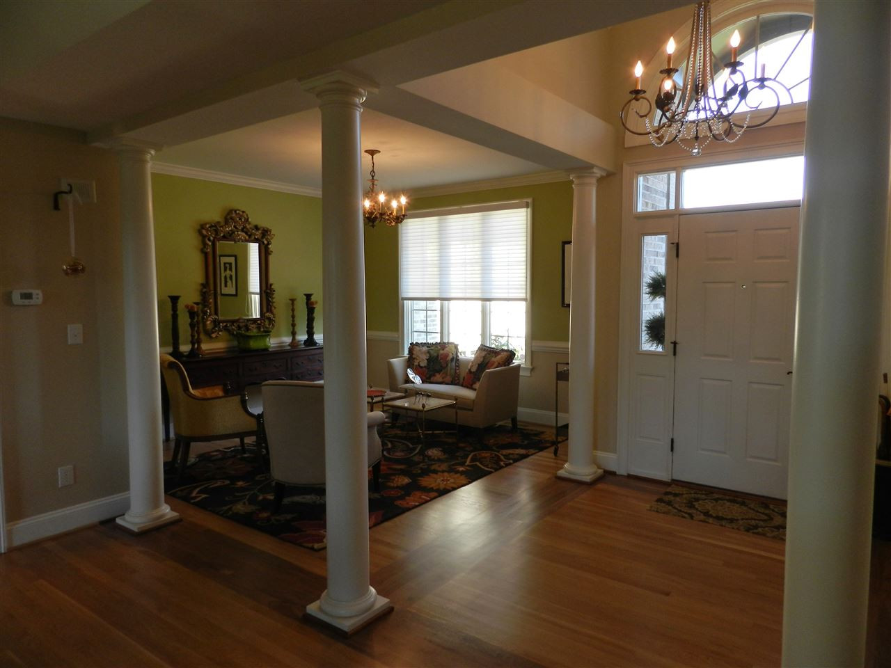 406 Cedar Ridge Way Durham, NC 27705 - Photo 4 of 25 Beautiful walnut inlay in hardwood floors Dining Room