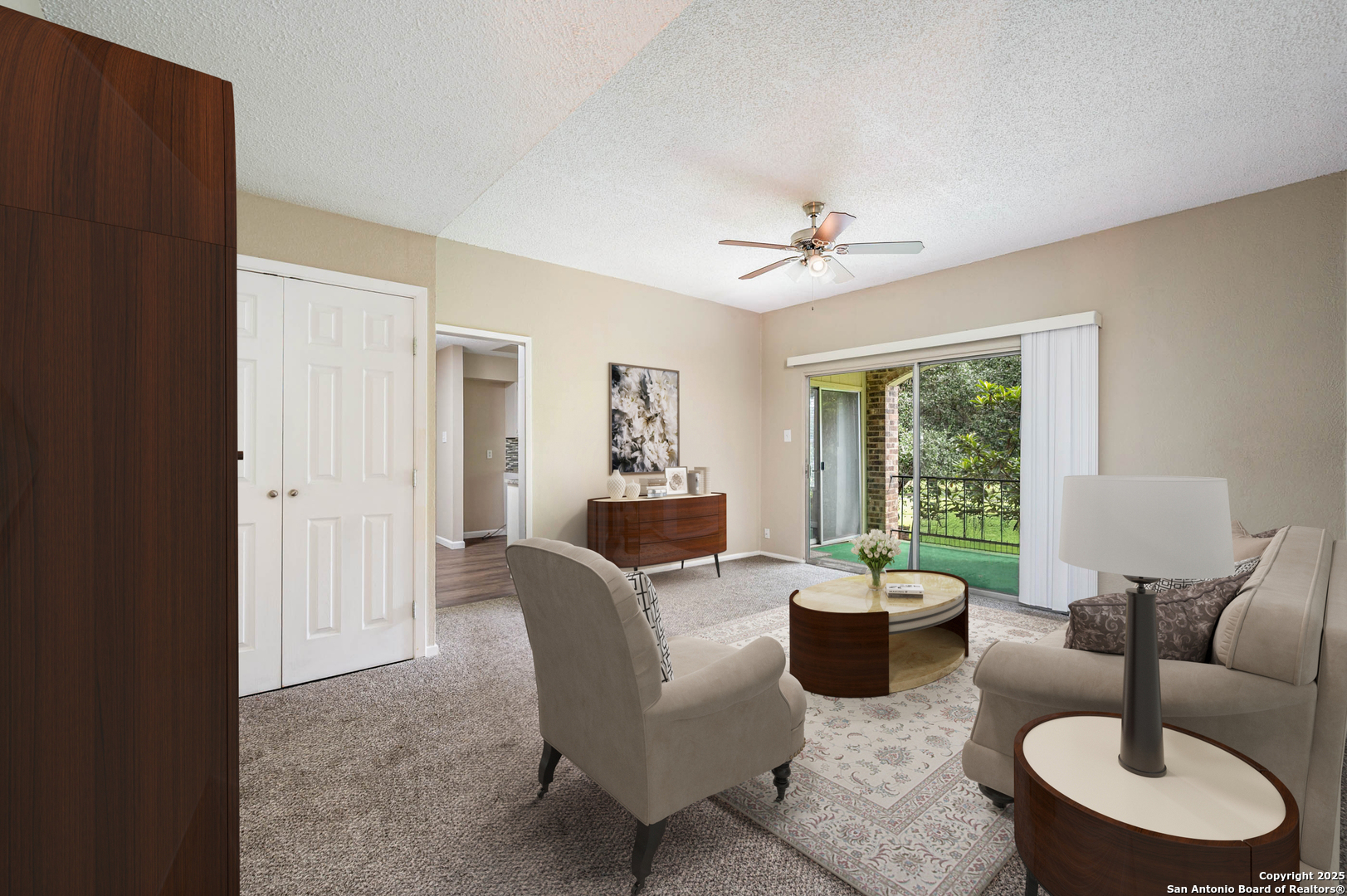 1819 Babcock Road, Unit 704 San Antonio, TX 78229 - Photo 12 of 28 a living room with furniture a lamp and a window