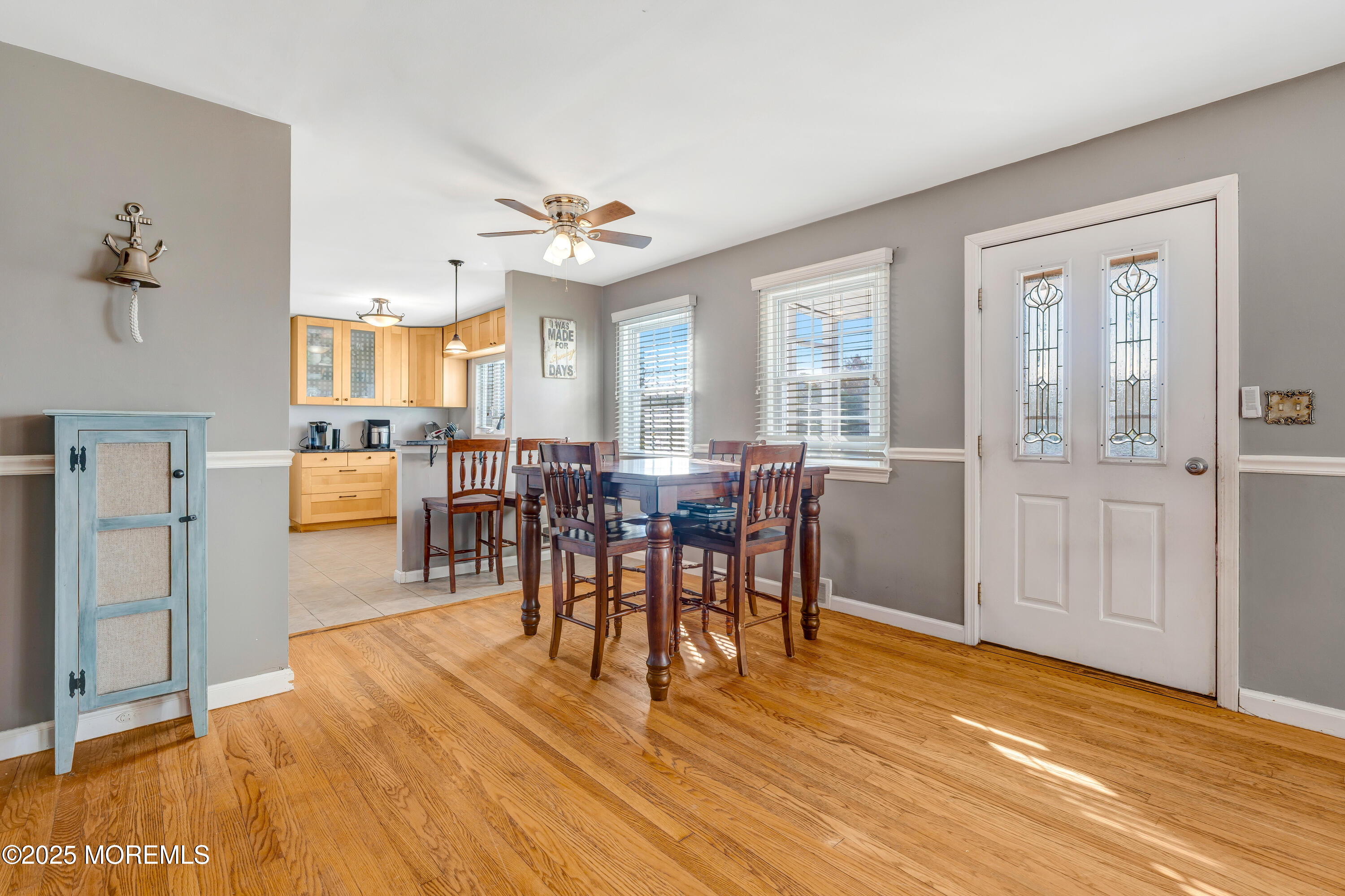 67 Victoria Place Red Bank, NJ 07701 - Photo 12 of 29 a view of a dining room with furniture and chandelier