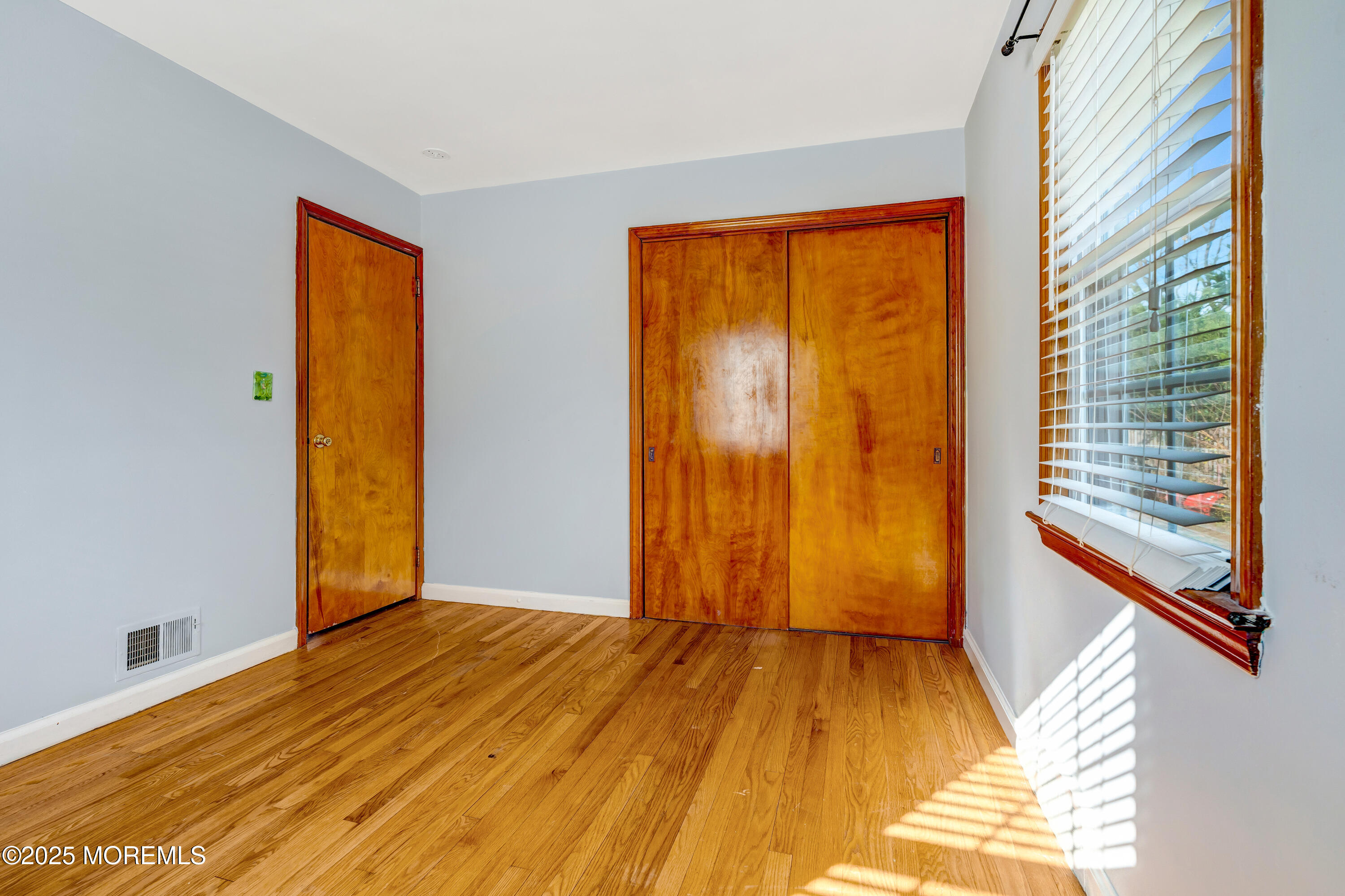 67 Victoria Place Red Bank, NJ 07701 - Photo 19 of 29 a view of a room with wooden floor and door