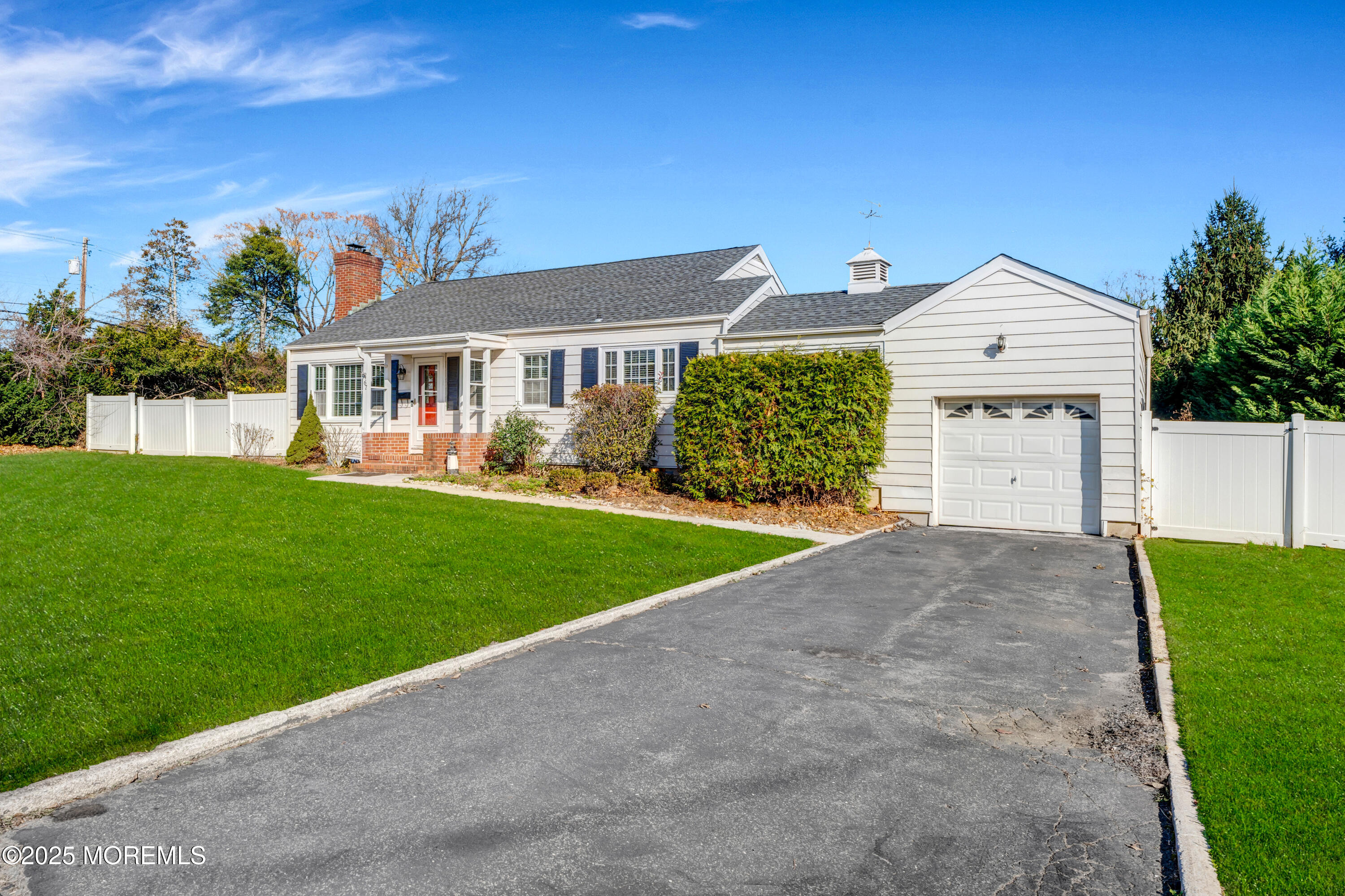 67 Victoria Place Red Bank, NJ 07701 - Photo 6 of 29 a front view of a house with a yard and garage