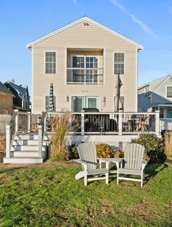 front view of a house with a swimming pool