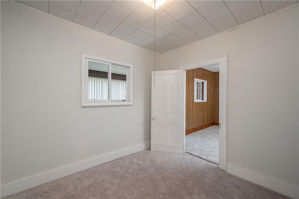 1438 Chicora Road Chicora, PA 16025 - Photo 14 of 25 an empty room with windows and closet