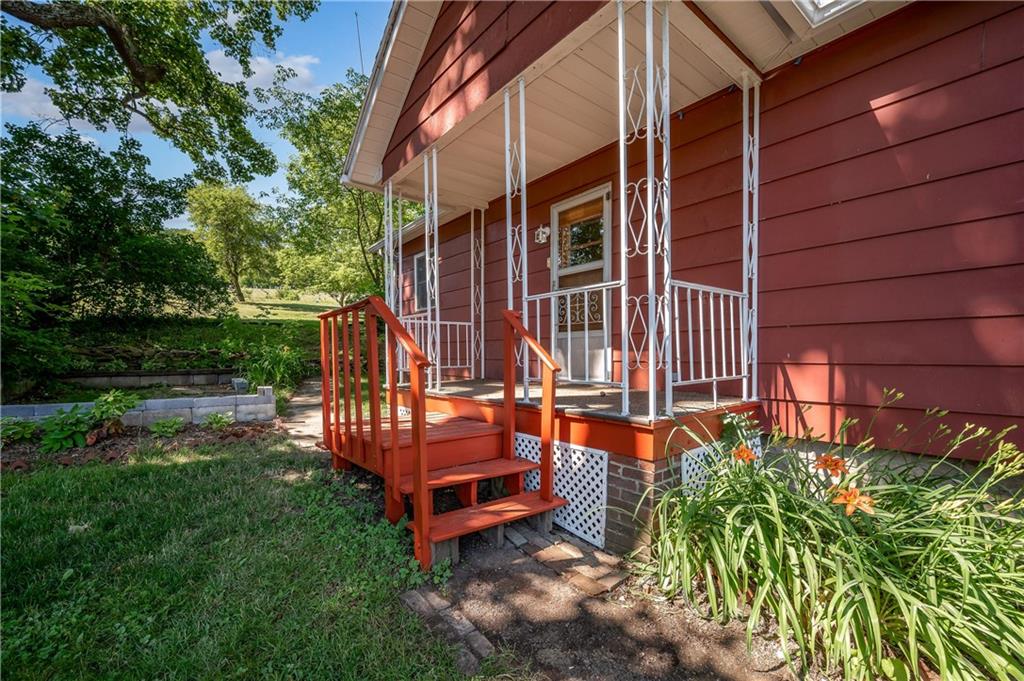 1438 Chicora Road Chicora, PA 16025 - Photo 5 of 25 front view of a house with a yard