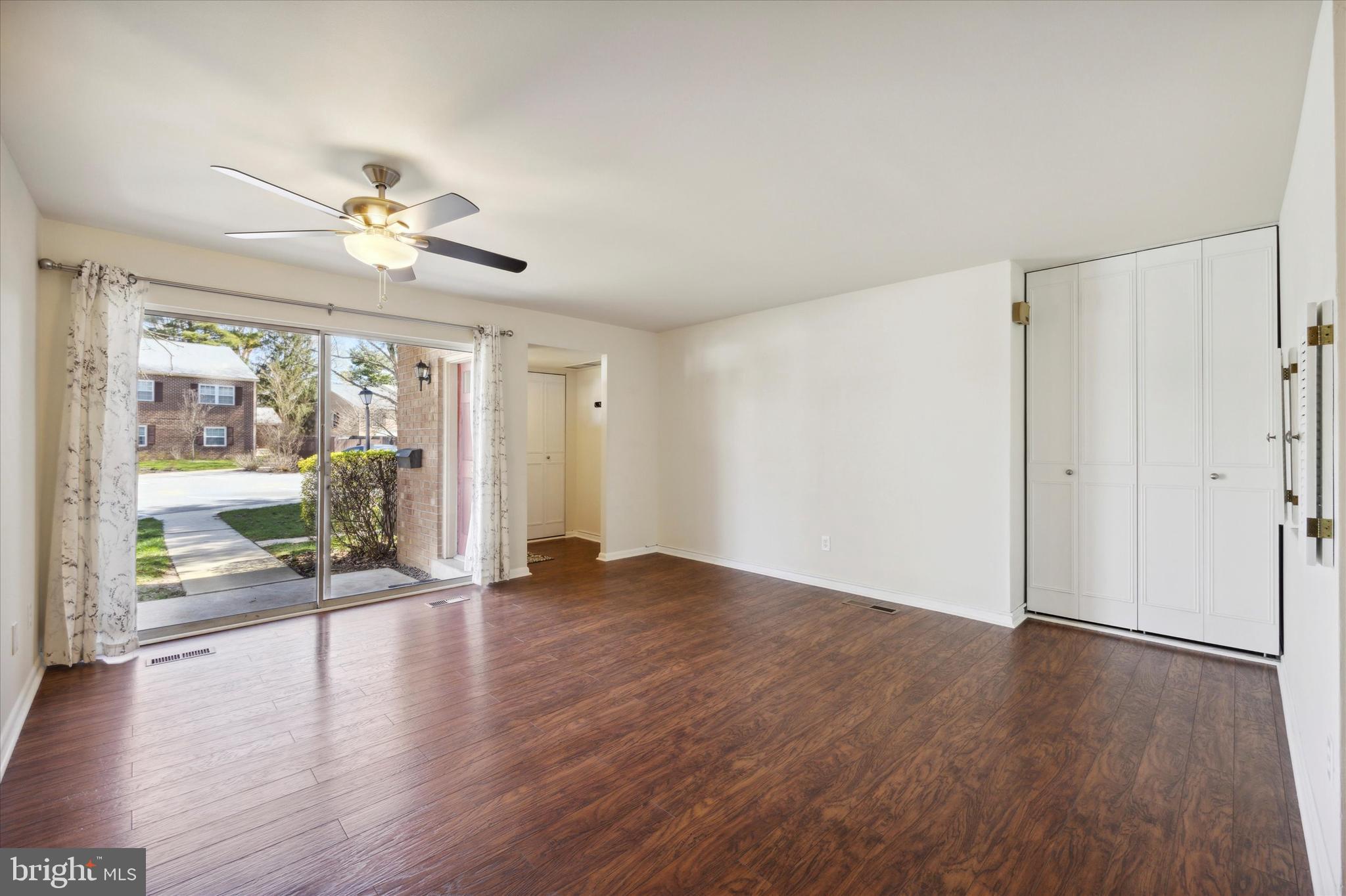 229 Old Forge Crossing Devon, PA 19333 - Photo 4 of 26 Living Room with ceiling fan, coat closet