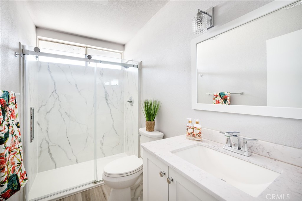 2254 Riverside Drive, Unit 2256 Los Angeles, CA 90039 - Photo 17 of 27 a bathroom with a sink toilet and shower