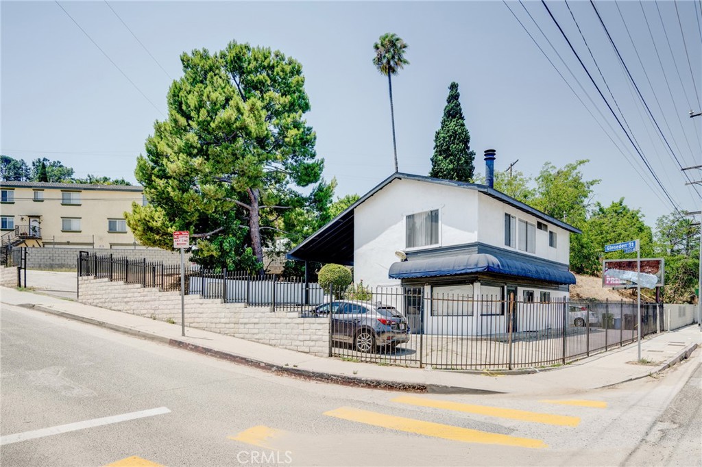 2254 Riverside Drive, Unit 2256 Los Angeles, CA 90039 - Photo 23 of 27 a view of a house with a small yard and plants