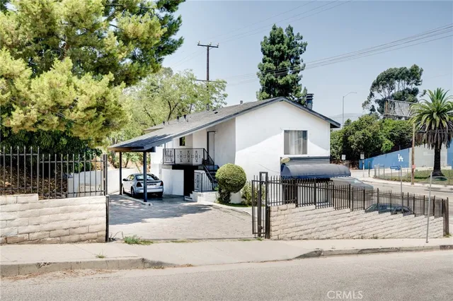 a view of a house with a patio