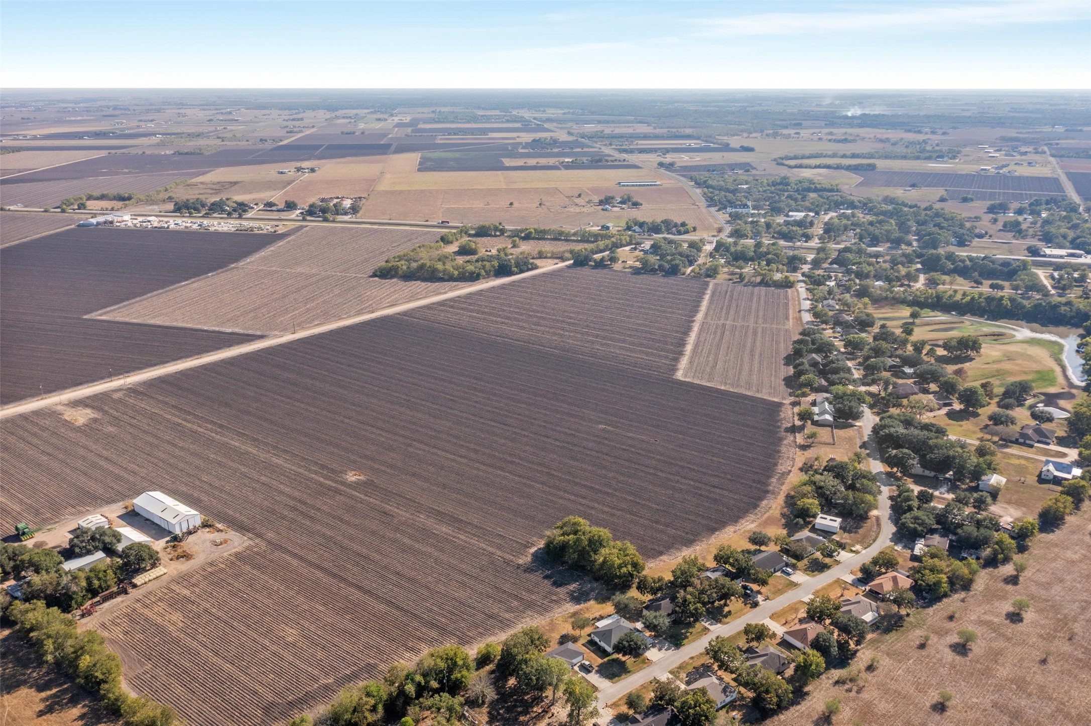 Tbd02 Scroggins Road Wallis, TX 77485 - Photo 5 of 23 an aerial view of a house with a city view