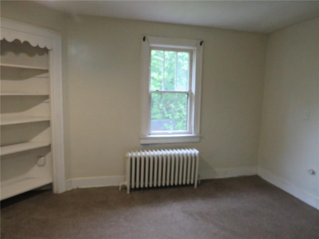 423 Braddock Road Pittsburgh, PA 15221 - Photo 25 of 36 an empty room with a window
