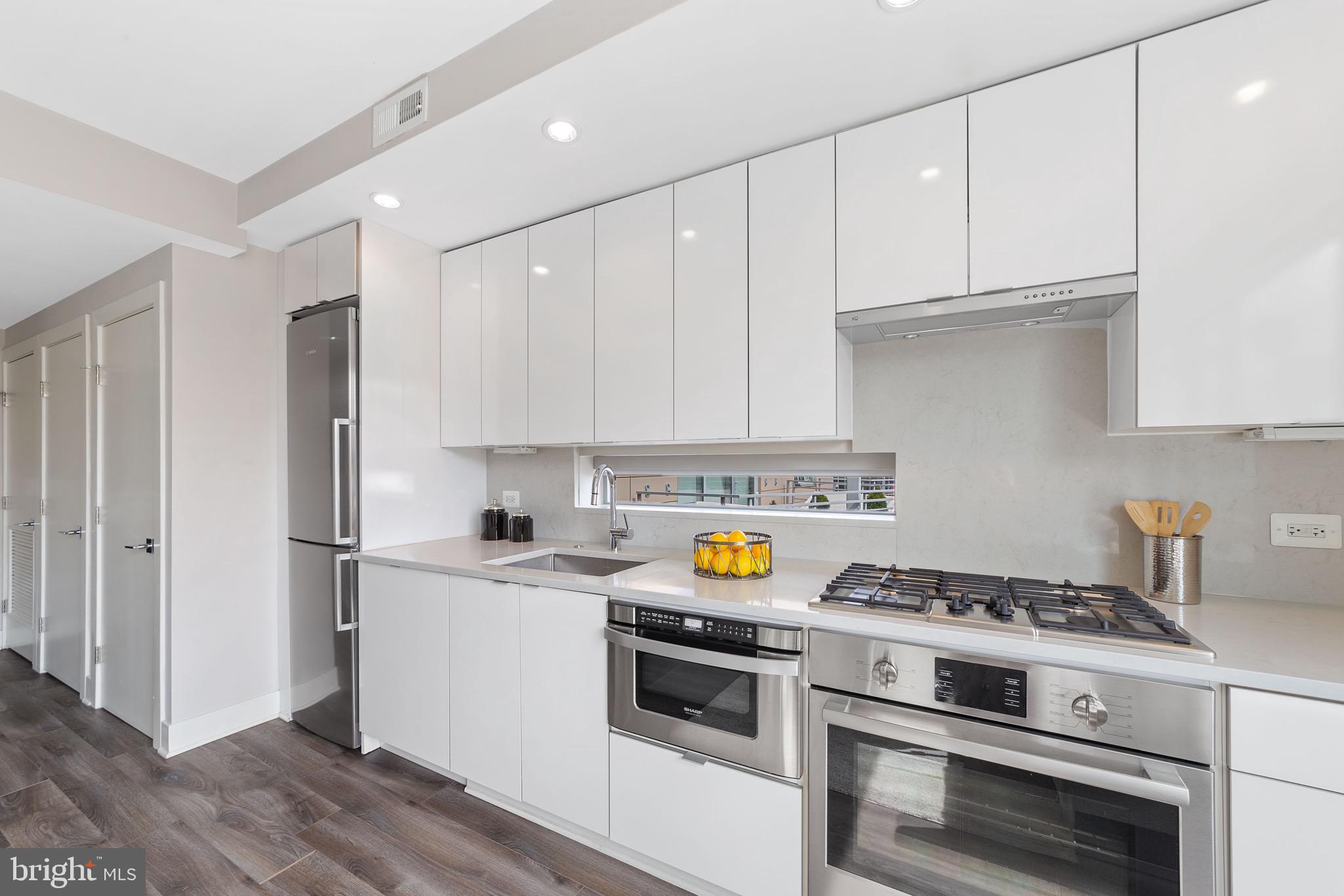 1311 13th Street Northwest, Unit PH9 Washington, DC 20005 - Photo 19 of 52 Upgraded Kitchen