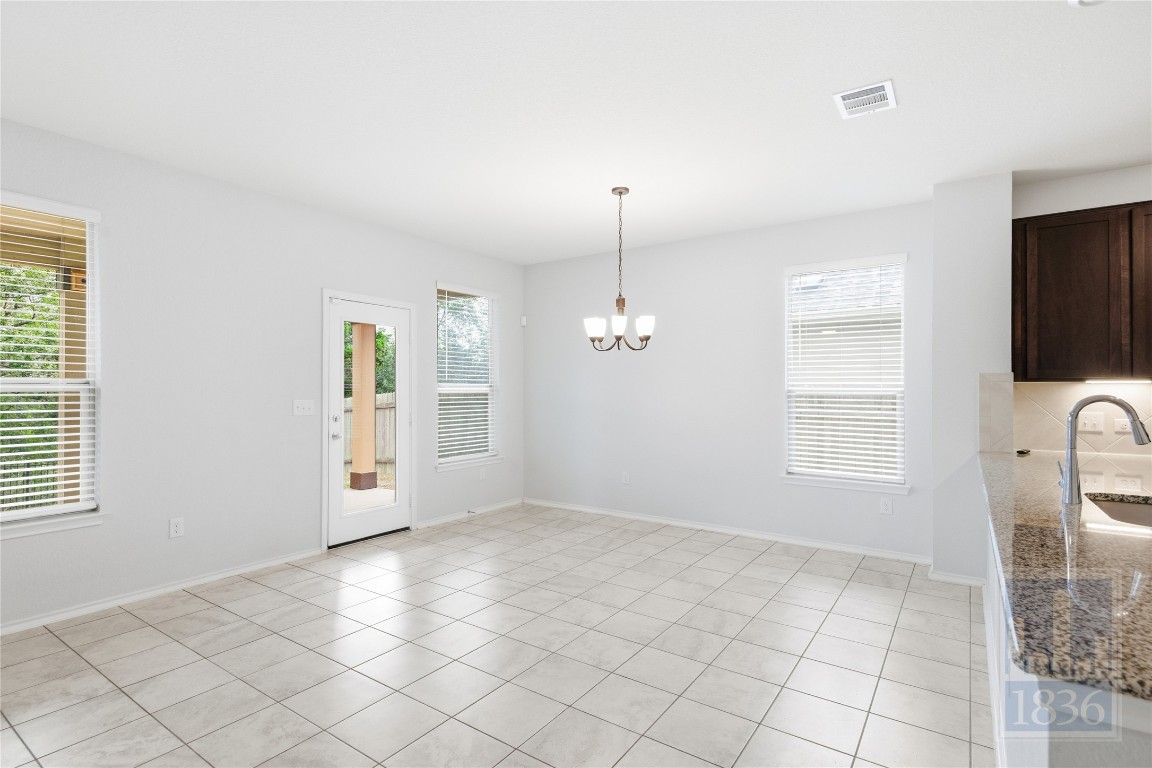 8005 Crystalbrook West Austin, TX 78724 - Photo 16 of 37 an empty room with windows