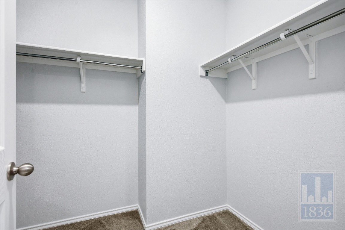 8005 Crystalbrook West Austin, TX 78724 - Photo 22 of 37 a view of a room with rack on the wall