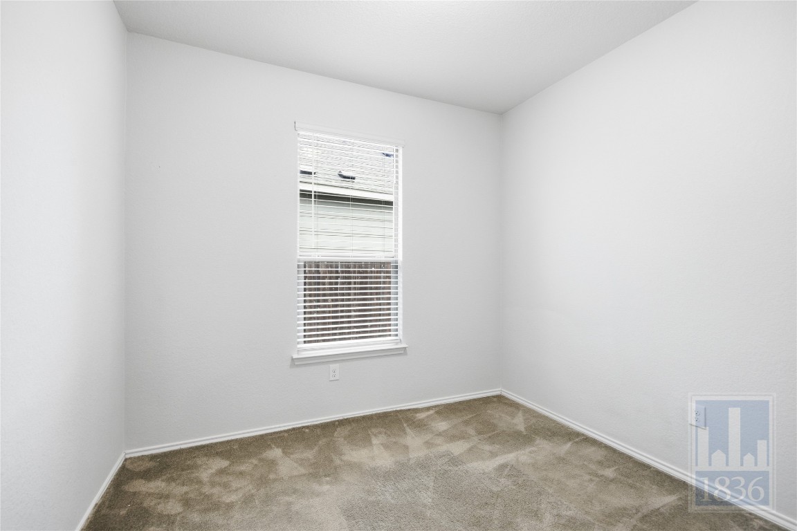 8005 Crystalbrook West Austin, TX 78724 - Photo 28 of 37 a view of an empty room with a window