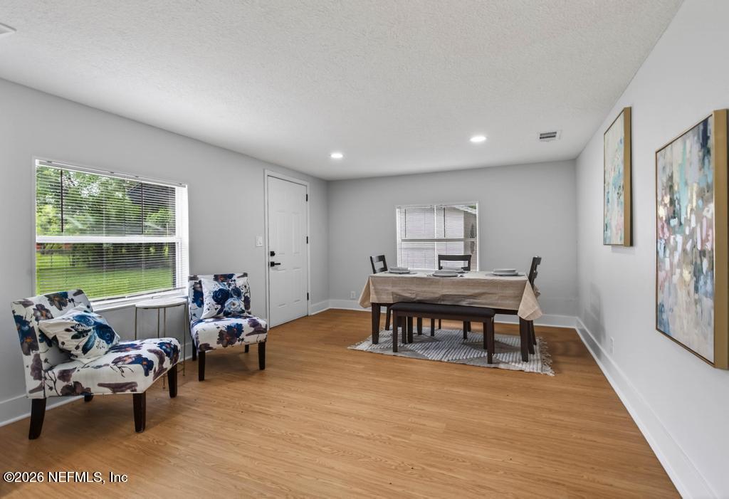 43739 Ratliff Road Callahan, FL 32011 - Photo 31 of 55 a living room with furniture and a large window
