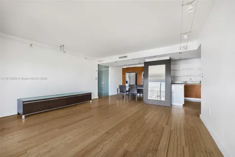 a view of workspace with wooden floor