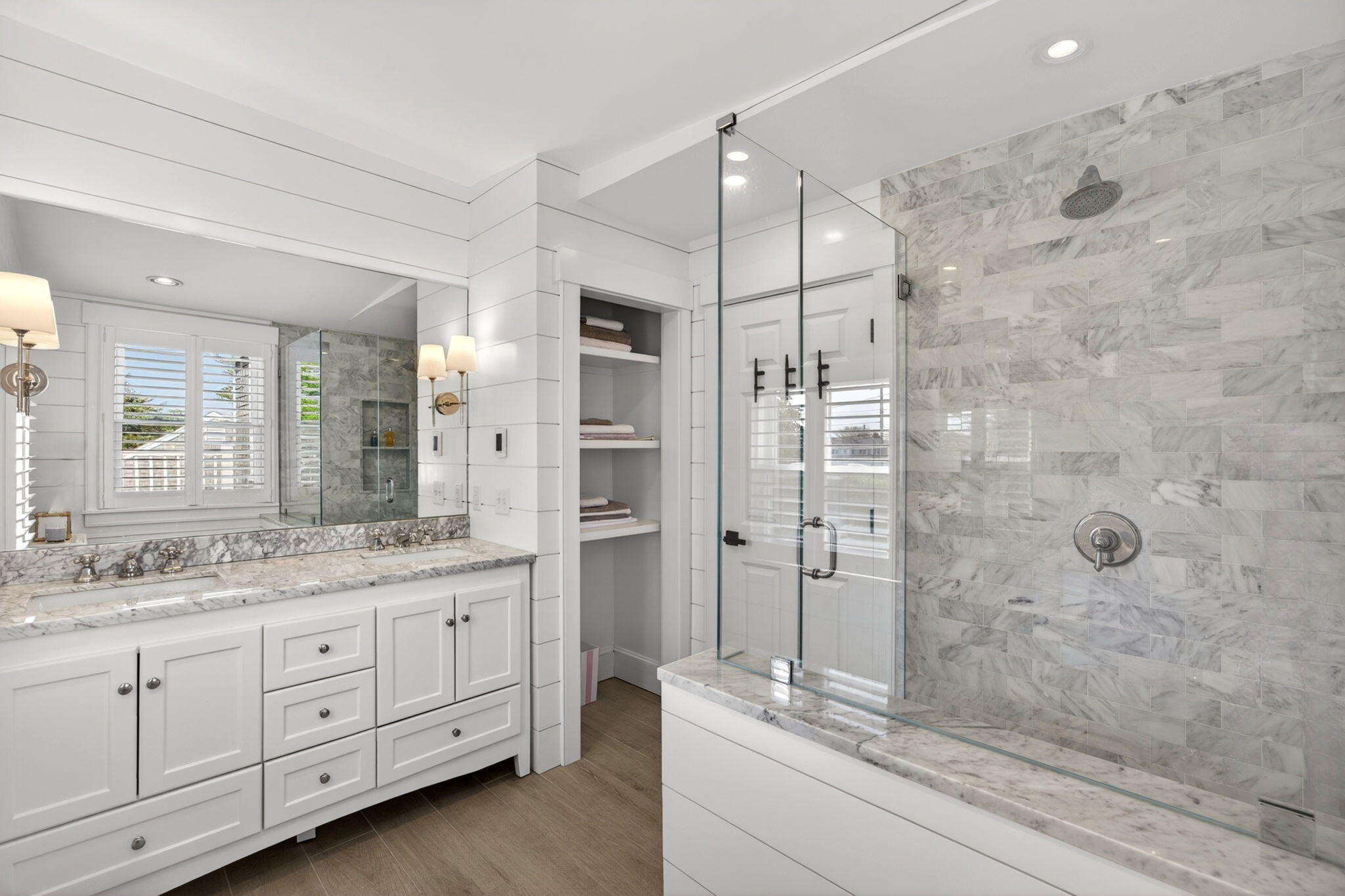 320 Old Harbor Road Chatham, MA 02633 - Photo 43 of 58 a spacious bathroom with a granite countertop sink a mirror a shower and a bathtub