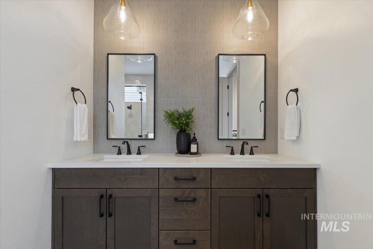8458 West Graye Street, Unit RAINIER Meridian, ID 83646 - Photo 17 of 29 Full bathroom featuring double vanity