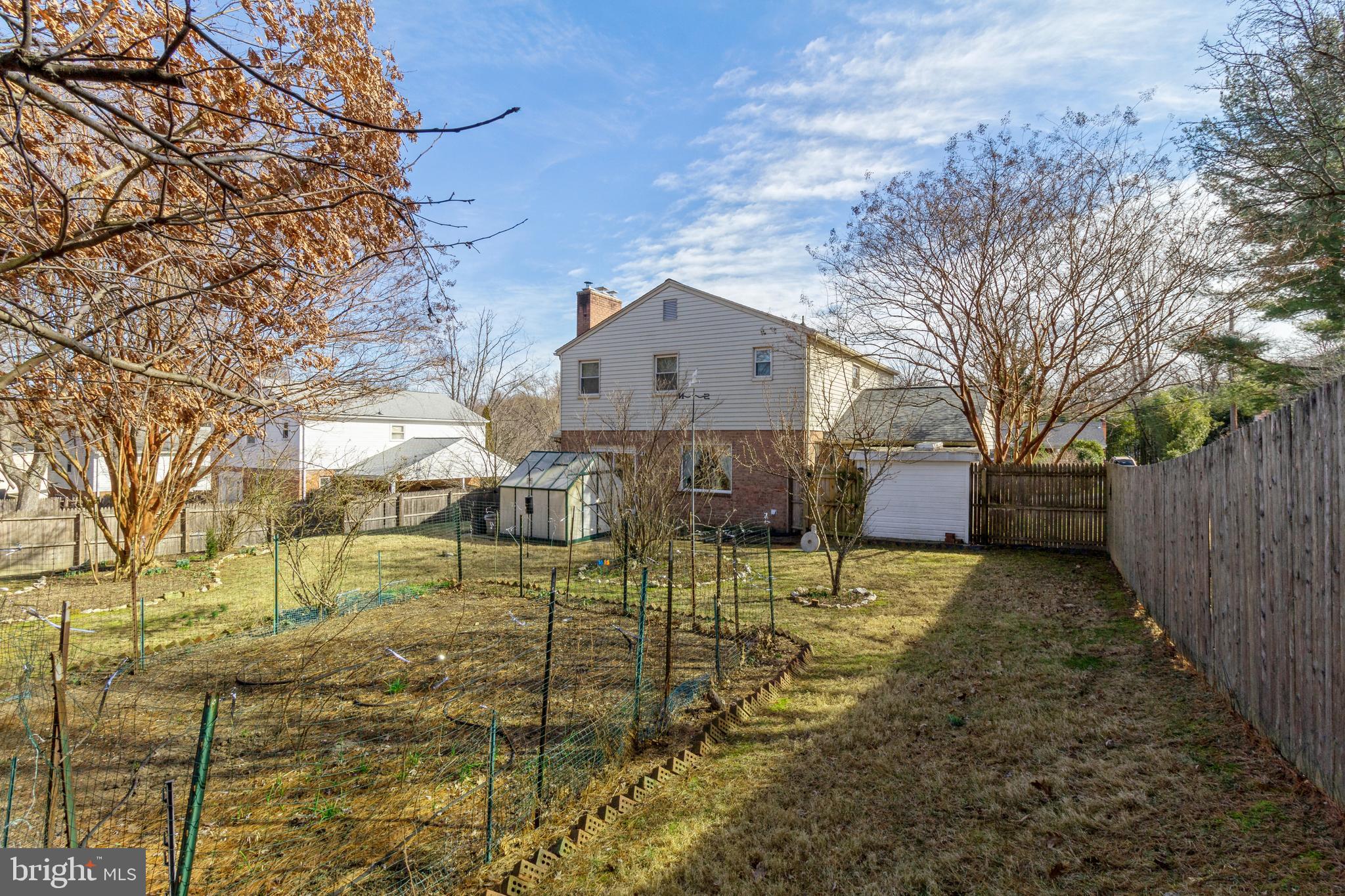 1817 Snowdrop Lane Silver Spring, MD 20906 - Photo 29 of 30 Backyard with Greenhouse